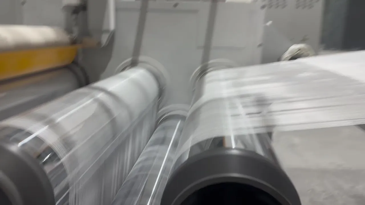 Film winding on production equipment
